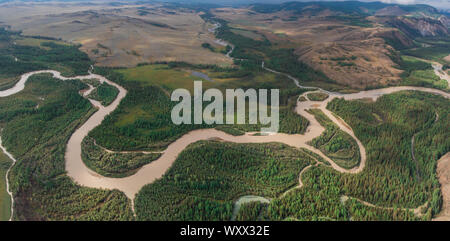 Kurai steppe and Chuya river on North-Chui ridge background. Altai mountains, Russia. Aerial drone panoramic picture. Stock Photo