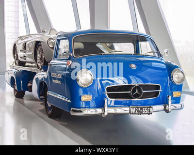 STUTTGART, GERMANY-APRIL 7, 2017: 1955 “Blue Wonder” Mercedes-Benz high-speed racing car transporter with the 1955 Mercedes-Benz 300 SLR racing sports Stock Photo