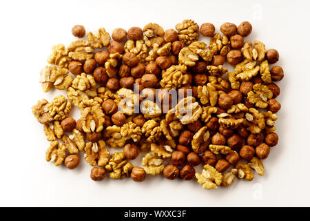 Overhead image of assorted nuts on white background Stock Photo