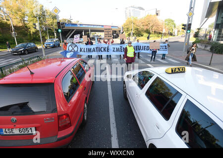 Prague, Czech Republic. 18th Sep, 2019. Some members of Extinction Rebellion group blockfor a few minutes Vyskocilova Street in Prague, Czech Republic, on September 18, 2019. The aim of the event was to highlight climate change. Credit: Ondrej Deml/CTK Photo/Alamy Live News Stock Photo