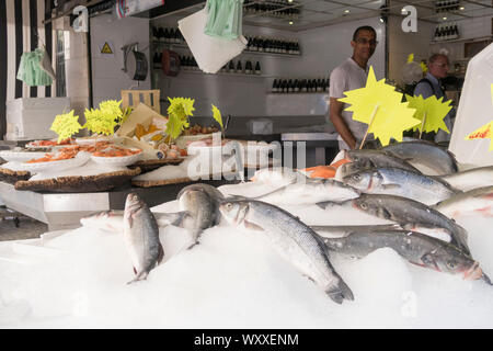 Paris, France - Aug 31, 2019: Fishmonger in n Rue Montorgueil, Market Street in Paris, France. Stock Photo