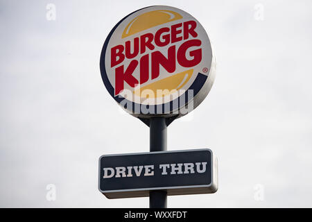 RETRANSMITTED REMOVING EMBARGO A sign for a Burger King drive thru restaurant. The fast food chain has announced that they are removing all plastic toys from its children's meals served in the UK from Thursday to save an estimated 320 tonnes of waste annually. Stock Photo