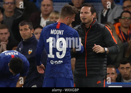 Manager of Chelsea, Frank Lampard with Mason Mount of Chelsea after being substituted with injury - Chelsea v Valencia, UEFA Champions League - Group H, Stamford Bridge, London, UK - 17th September 2019  Editorial Use Only Stock Photo