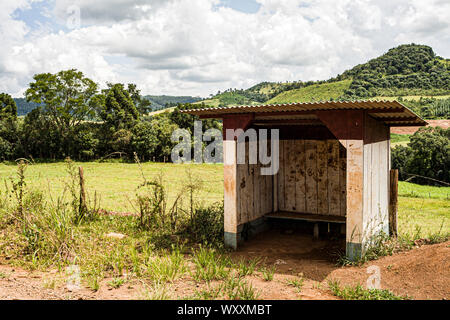 Wooden bus shelter in countryside. Passos Maia, Santa Catarina, Brazil. Stock Photo