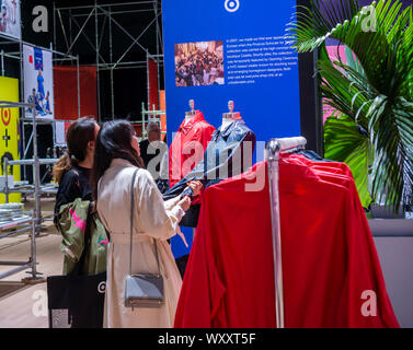 Fashion designers and customers Stock Photo - Alamy