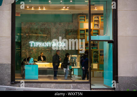 Customers shop in the Tiffany & Co. store in Rockefeller Center in New York on Friday, September 6, 2019.  (© Richard B. Levine) Stock Photo