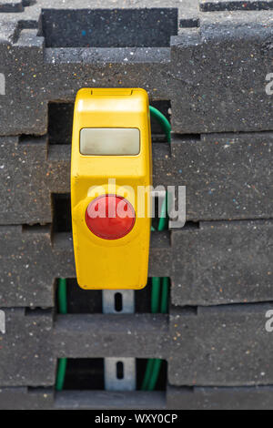 Big Red Bush Button for Temporary Traffic Light Stock Photo