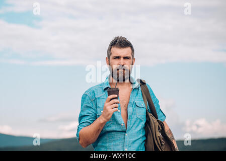 going to work. mature hipster drink coffee. male with beard. full of energy. Good morning coffee. brutal bearded man with take away coffee. Morning Stock Photo