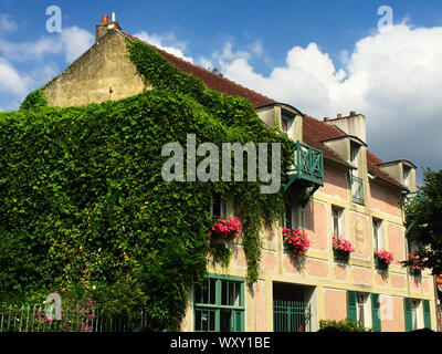 Stone houses in the village of Giverny near Claude Monet's house Stock Photo