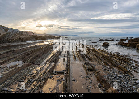 Flysch, Itzurun Beach, a sequence of sedimentary rock layers, Zumaia, Basque Country, Spain Stock Photo