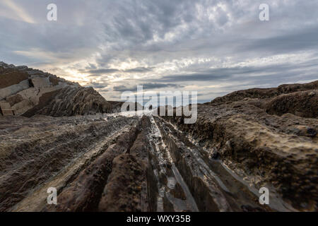 Flysch, Itzurun Beach, a sequence of sedimentary rock layers, Zumaia, Basque Country, Spain Stock Photo