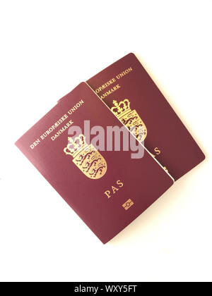 Two new danish passports on the white background Stock Photo