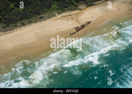 Rusty hulk of the New Zealand hospital ship SS Maheno shipwreck on Fraser Island, Australia Stock Photo