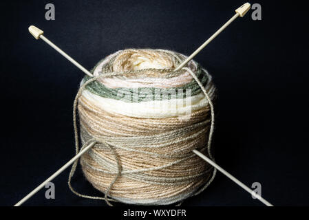 Ball of yarn and knitting needles Stock Photo