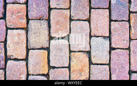 Cobblestone street as a stone background. Stock Photo