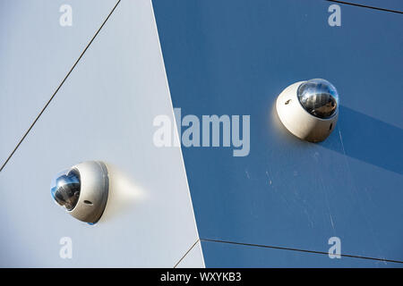 closeup on security CCTV camera or surveillance system in office building Stock Photo