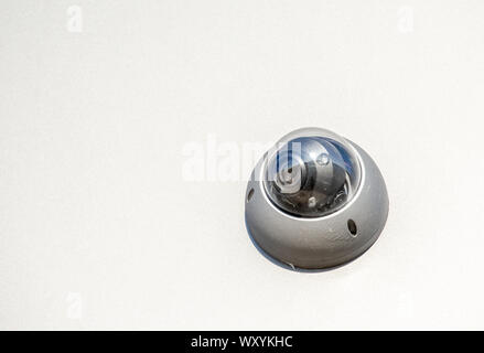 closeup on security CCTV camera or surveillance system in office building Stock Photo