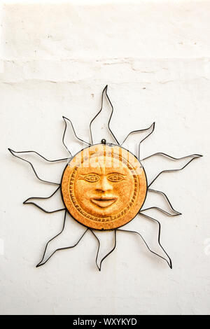 Sun face Talavera wall sculpture Puerto Vallarta, Jalisco, Mexico. Stock Photo