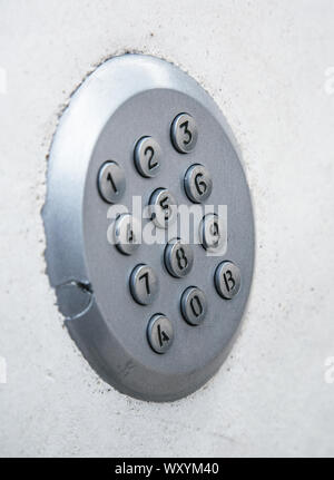 Security access with keypad on the wall Stock Photo