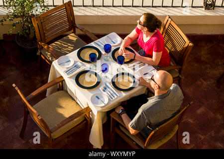 Couple on outdoor balcony restaurant, Puerto Vallarta, Jalisco, Mexico. Stock Photo