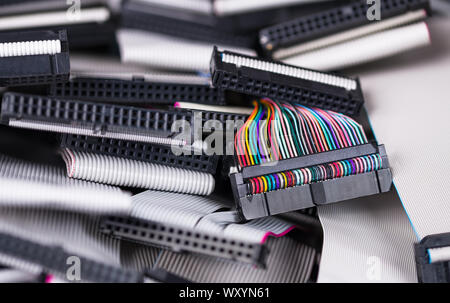 Internal flat parallel computer cables and connectors. Integrated drive electronics for old data storage devices such as floppy, optical or hard disks. Stock Photo