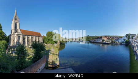 View east in the town of Marlow in the Wycombe district of Buckinghamshire, southeast England of All Saints Church and the River Thames Stock Photo