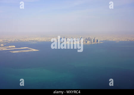 DOHA, QATAR -17 JUN 2019- Aerial view of the modern skyline of downtown Doha. The capital of Qatar will host the 2022 FIFA World Cup of soccer. Stock Photo