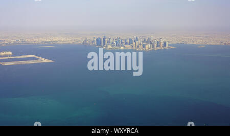 DOHA, QATAR -17 JUN 2019- Aerial view of the modern skyline of downtown Doha. The capital of Qatar will host the 2022 FIFA World Cup of soccer. Stock Photo