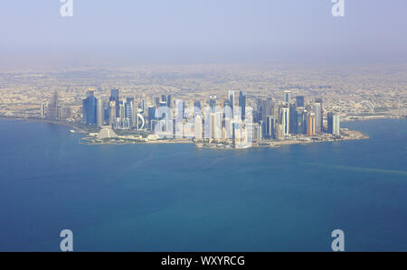 DOHA, QATAR -17 JUN 2019- Aerial view of the modern skyline of downtown Doha. The capital of Qatar will host the 2022 FIFA World Cup of soccer. Stock Photo