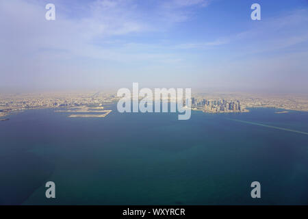 DOHA, QATAR -17 JUN 2019- Aerial view of the modern skyline of downtown Doha. The capital of Qatar will host the 2022 FIFA World Cup of soccer. Stock Photo