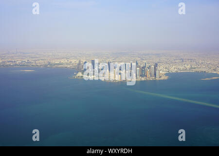 DOHA, QATAR -17 JUN 2019- Aerial view of the modern skyline of downtown Doha. The capital of Qatar will host the 2022 FIFA World Cup of soccer. Stock Photo