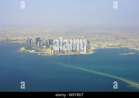 DOHA, QATAR -17 JUN 2019- Aerial view of the modern skyline of downtown Doha. The capital of Qatar will host the 2022 FIFA World Cup of soccer. Stock Photo