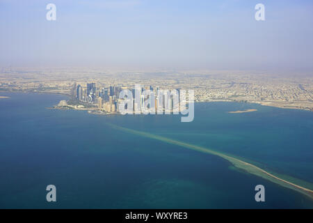 DOHA, QATAR -17 JUN 2019- Aerial view of the modern skyline of downtown Doha. The capital of Qatar will host the 2022 FIFA World Cup of soccer. Stock Photo