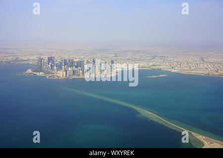 DOHA, QATAR -17 JUN 2019- Aerial view of the modern skyline of downtown Doha. The capital of Qatar will host the 2022 FIFA World Cup of soccer. Stock Photo