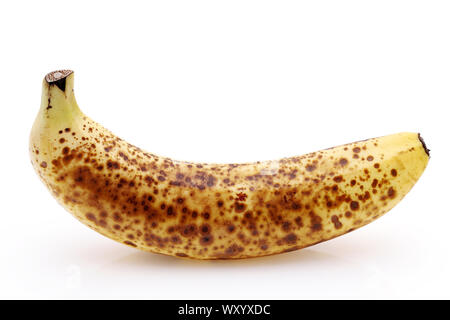 Close up of an over-ripe banana isolated on white background Stock Photo