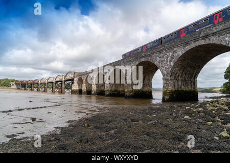 Rail Bridge over the River Tavy Devon Dartmoor Plymouth for the Tamar Valley Passenger Railway with Train on the Bridge Stock Photo