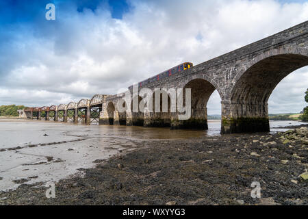 Rail Bridge over the River Tavy Devon Dartmoor Plymouth for the Tamar Valley Passenger Railway with Train on the Bridge Stock Photo