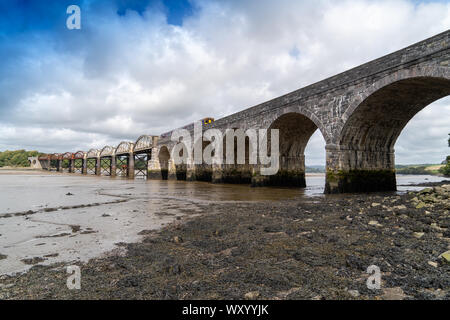 Rail Bridge over the River Tavy Devon Dartmoor Plymouth for the Tamar Valley Passenger Railway with Train on the Bridge Stock Photo