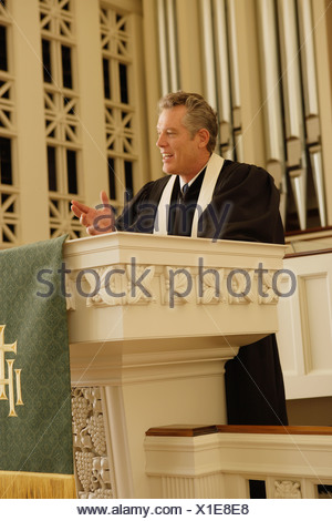 Priest standing at pulpit Stock Photo: 17106131 - Alamy