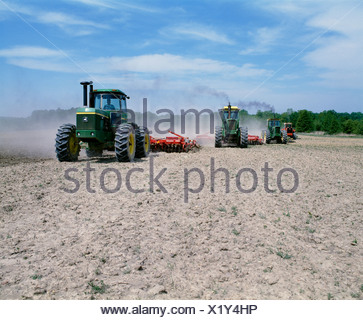 DISKING AND APPLYING PESTICIDE TO CORN GROUND Stock Photo ...