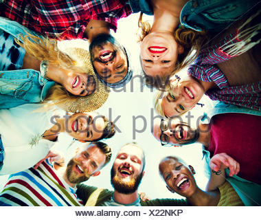 Friends Huddle Join Holiday Party Group Concept