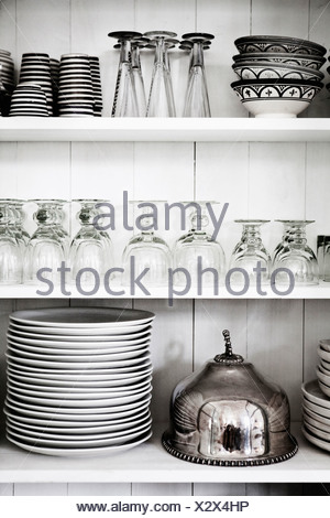 Shelves with glasses, plates and bowls
