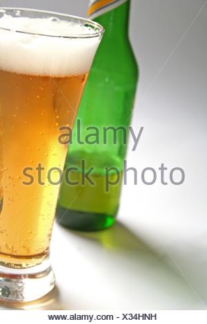 Download A Plain Amber Glass Beer Bottle Next To Another With Droplets Of Condensation On An Isolated White Studio Background 3d Render Stock Photo Alamy Yellowimages Mockups