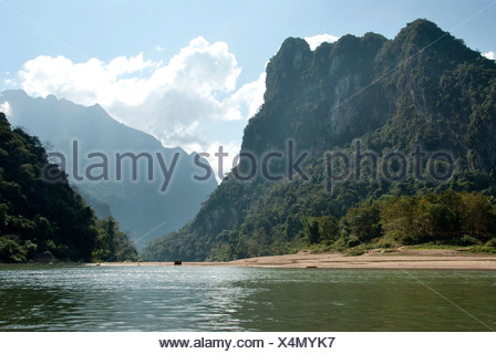 Karst landscape, forested mountains on the Nam Ou River in Muang Ngoi Kao, Luang Prabang province, Laos, Southeast Asia, Asia