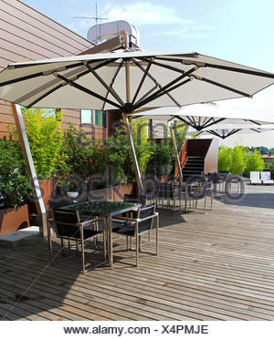 Rooftop Terrace With Small Green Garden Oasis Stock Photo