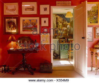 Antique Console Table In Small Cottage Hall With Open Front Door