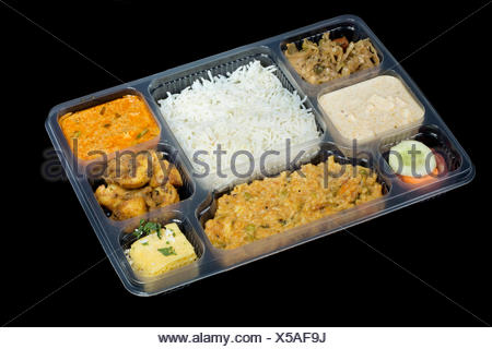 Rajasthani Thali packed in In lunch Box, Pune, India Stock Photo - Alamy