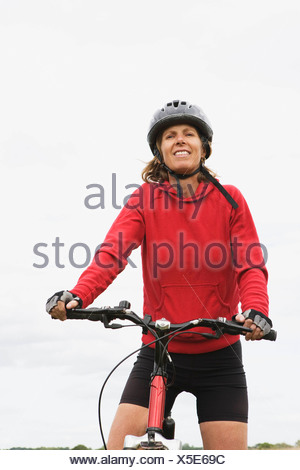 Woman cyclist on bicycle