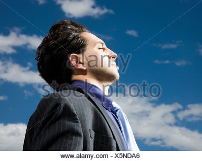 man in a suit with head tilted back Stock Photo: 28630961 - Alamy