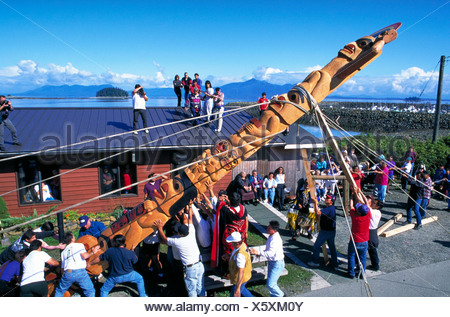 NATIVE AMERICAN TSIMSHIAN TRIBE RAISING A TOTEM POLE AT METLAKATLA ...